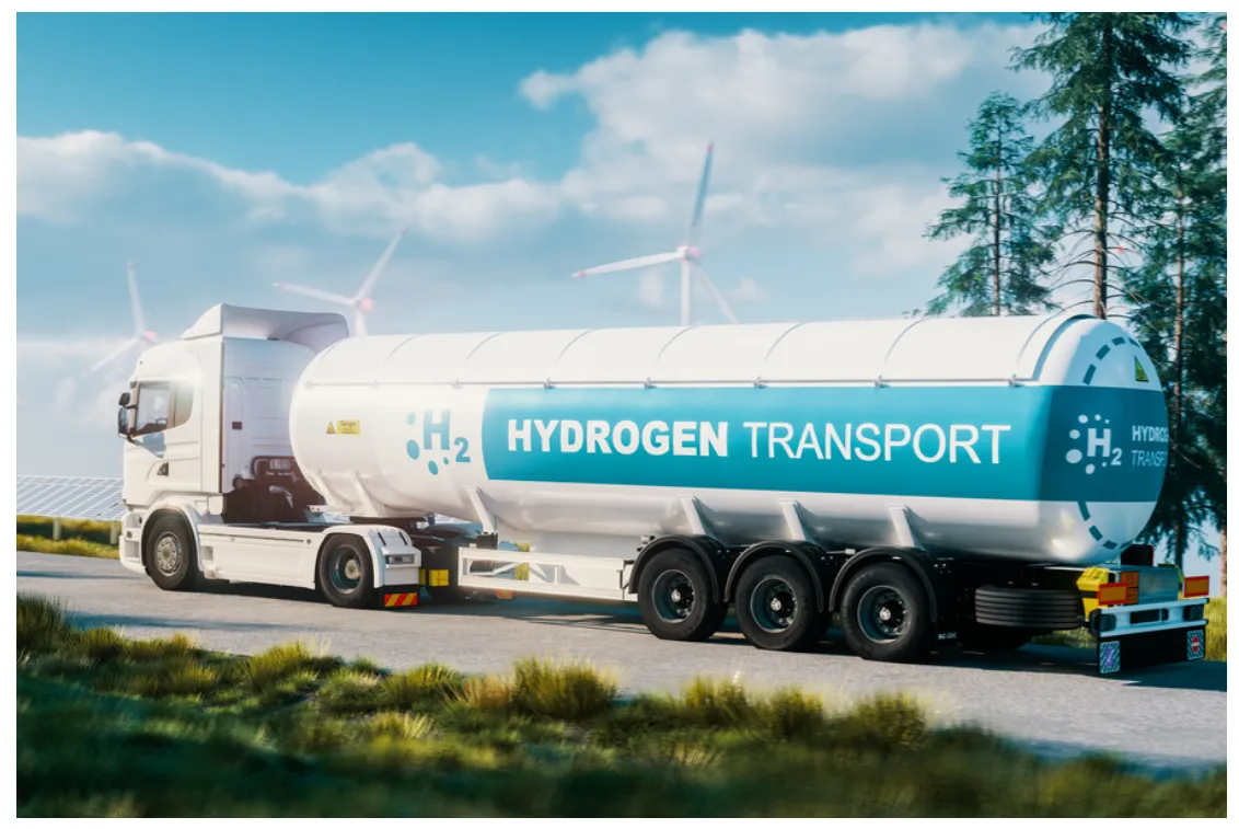 Esta imagen ilustra el transporte de hidrógeno mediante un camión cisterna especializado, destacando el uso de energías limpias en la logística.